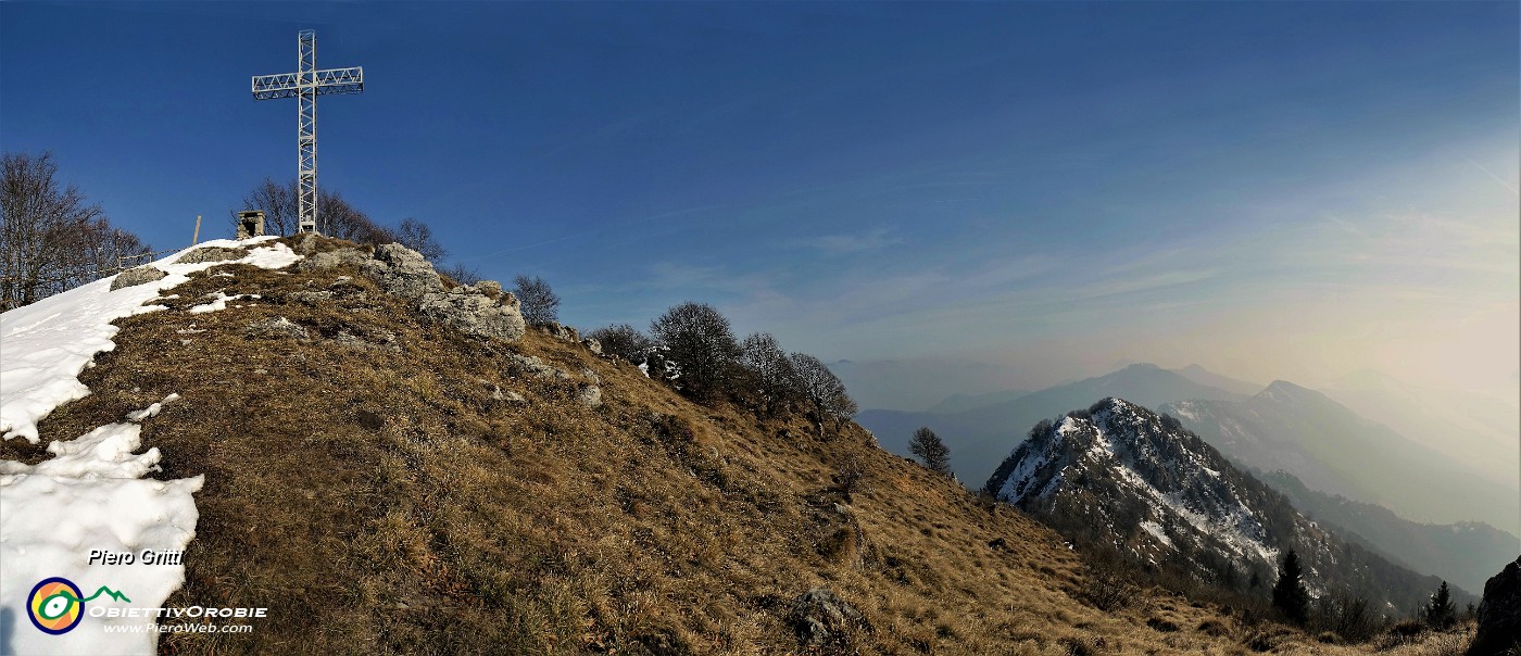63 Alla croce di vetta del Monte Suchello (1541 m).jpg